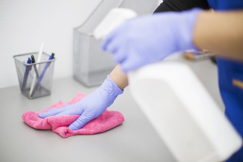 Bloomsbury Cleaners staff wearing PPE during a safe cleaning task