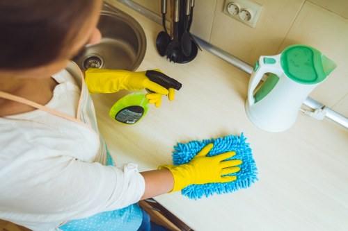 Waste removal team pricing a clear-out job in a Bloomsbury flat